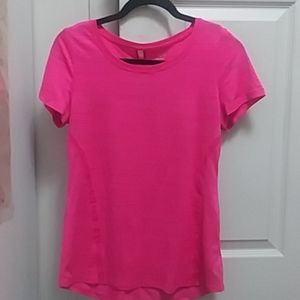 I pink shirt, 1 pair of flats, and 2 black shoes